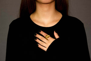 The Big Triple Knot Ring